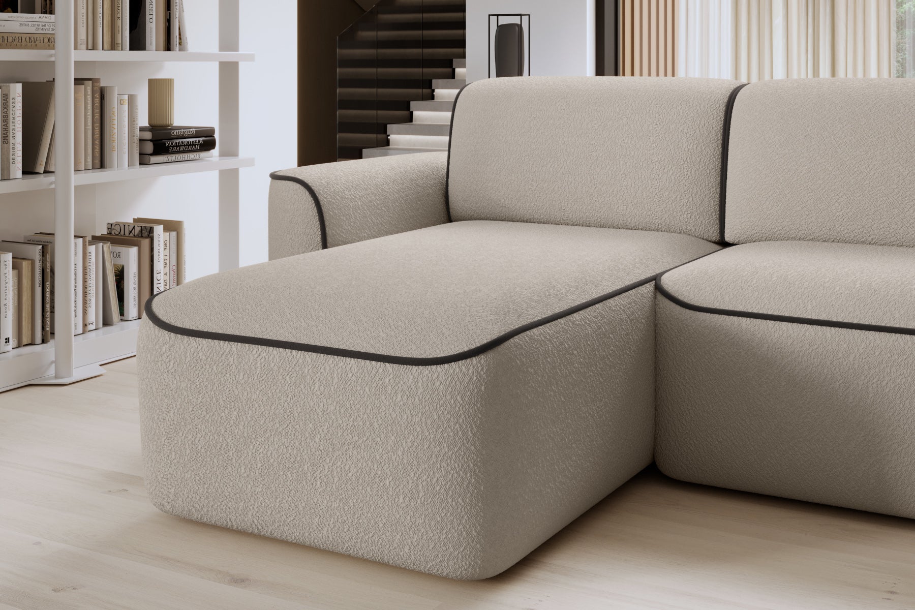 Zbliżenie łączenia oparcia z szezlongiem w układzie lewym, pokazujące fakturę tkaniny Royal 18 beżowy i lamówkę Velvetmat 22 brązowy.