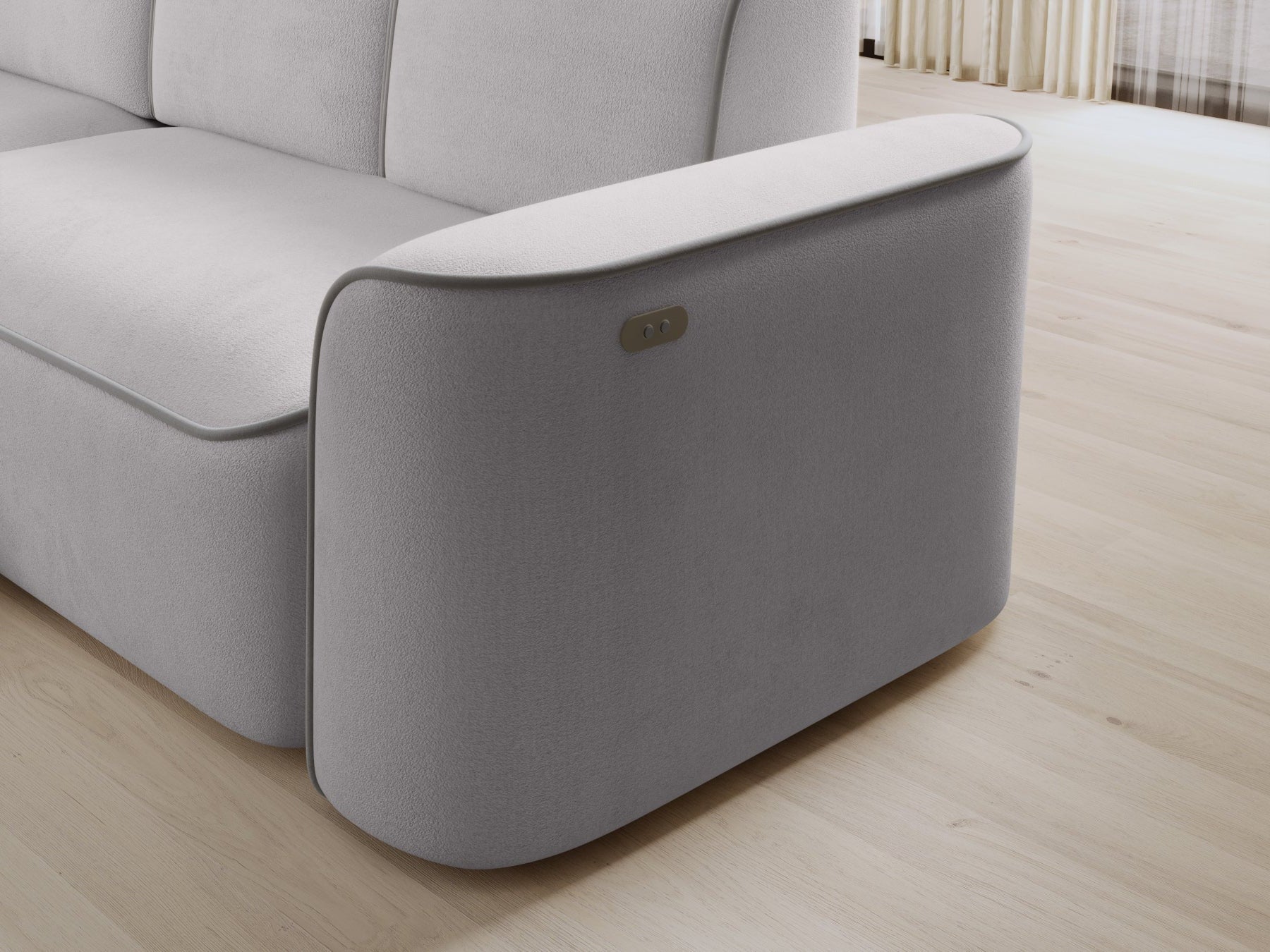 Lewy bok narożnika Ume Amore 03 beżowy z lamówką Paros 05 jasnoszarą z widocznym metalowym panelem sterowania.