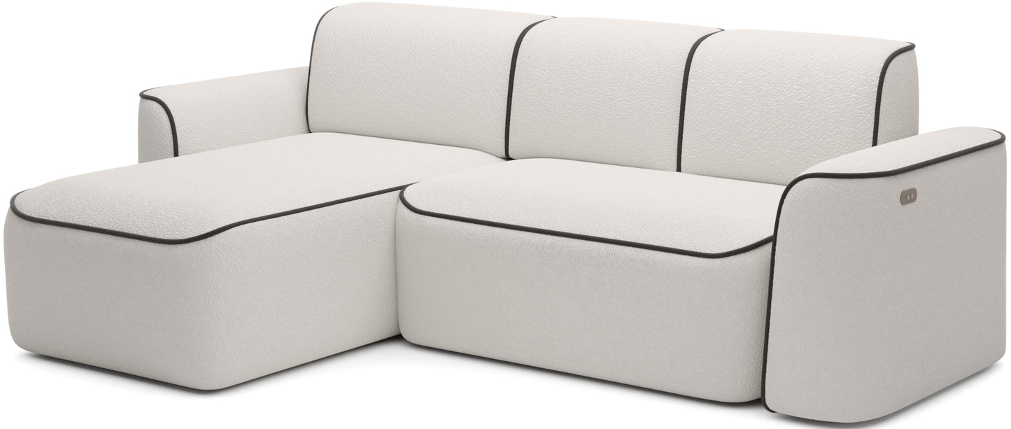 Boczny, perspektywiczny widok narożnika Ume w układzie lewym na białym tle, fakturowane bouclé Royal 01 z wykończeniem Velvetmat 22.