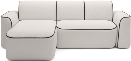 Przód narożnika Ume w układzie lewym na białym tle, tapicerka bouclé Royal 01 biały z kontrastową lamówką Velvetmat 22 brązowy.