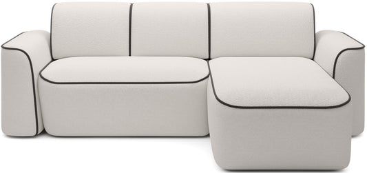 Przód narożnika Ume w układzie prawym, tapicerka bouclé Royal 01 biały z kontrastową lamówką Velvetmat 22 brązowy na białym tle.