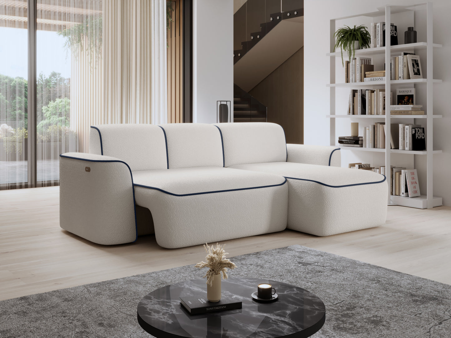 Narożnik Ume z prawą otomanką we wnętrzu z regałem na książki i lampą stojącą, tapicerka Royal 01 biały z lamówką Velvetmat 40 granatowy.