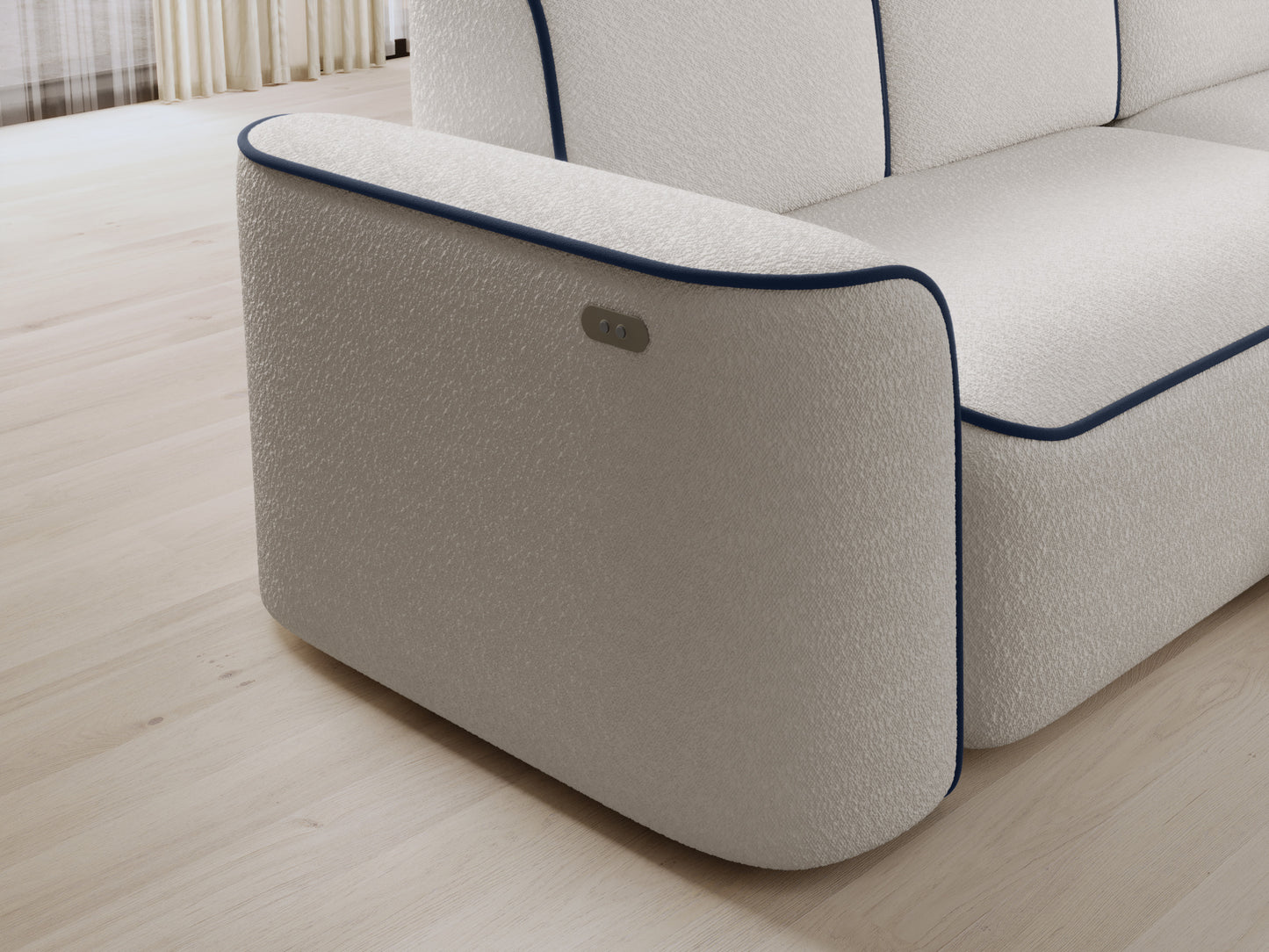Zbliżenie prawego podłokietnika sofy Ume z wbudowanymi przyciskami sterującymi, teksturowane bouclé Royal 01 biały i kontrastowa lamówka Velvetmat 40 granatowy.