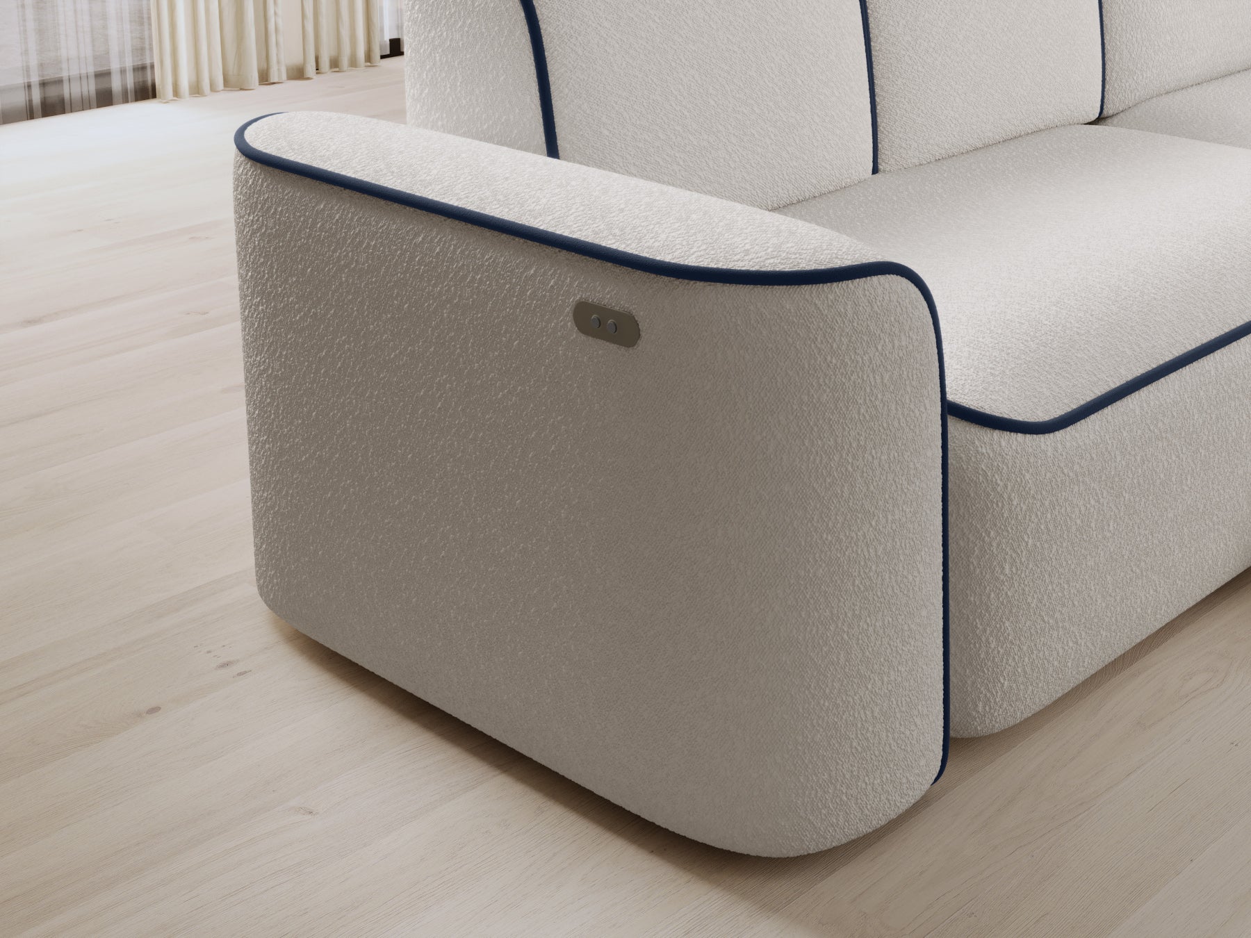Zbliżenie prawego podłokietnika sofy Ume z wbudowanymi przyciskami sterującymi, teksturowane bouclé Royal 01 biały i kontrastowa lamówka Velvetmat 40 granatowy.