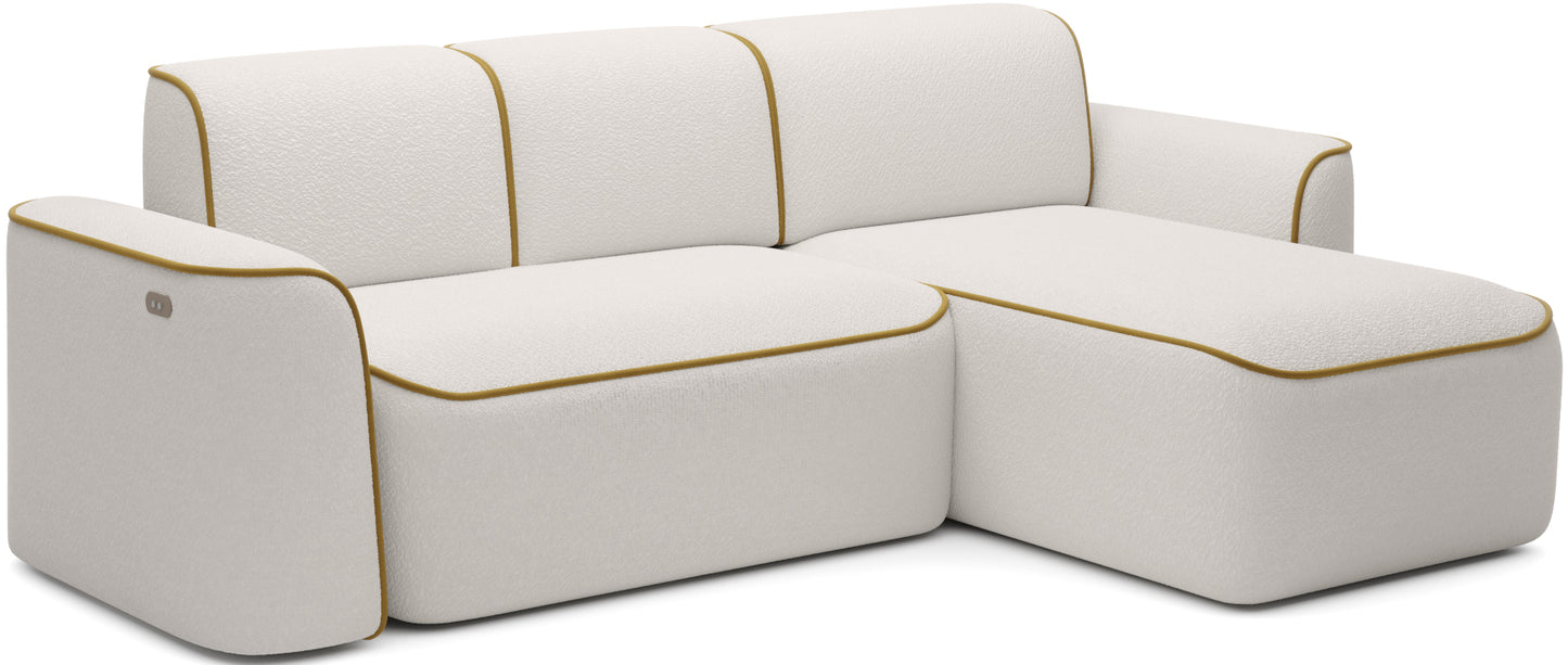 Frontowo-boczny widok sofy Ume w układzie prawym na białym tle, biała tekstura bouclé i żółta lamówka.