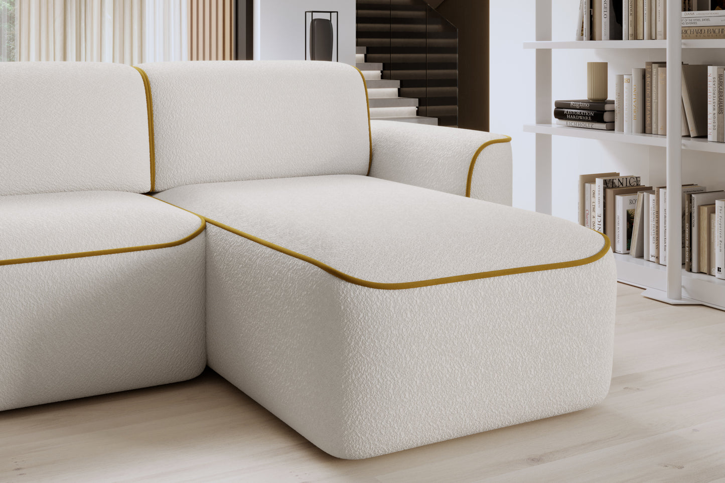 Zbliżenie na prawą otomankę sofy Ume z zaokrąglonym narożnikiem, fakturowaną białą tapicerką i kontrastową żółtą lamówką.
