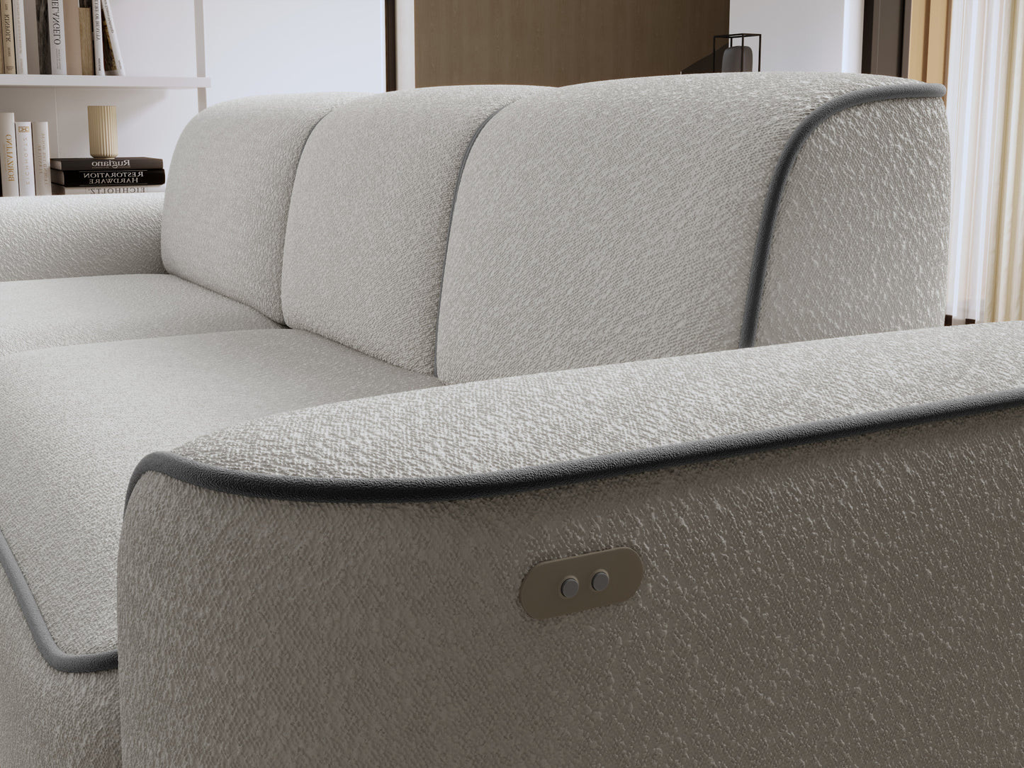 Zbliżenie na oparcie i lewy podłokietnik sofy Ume, teksturowane bouclé Royal 03 biały z kontrastową lamówką Velvetmat 04 szary.