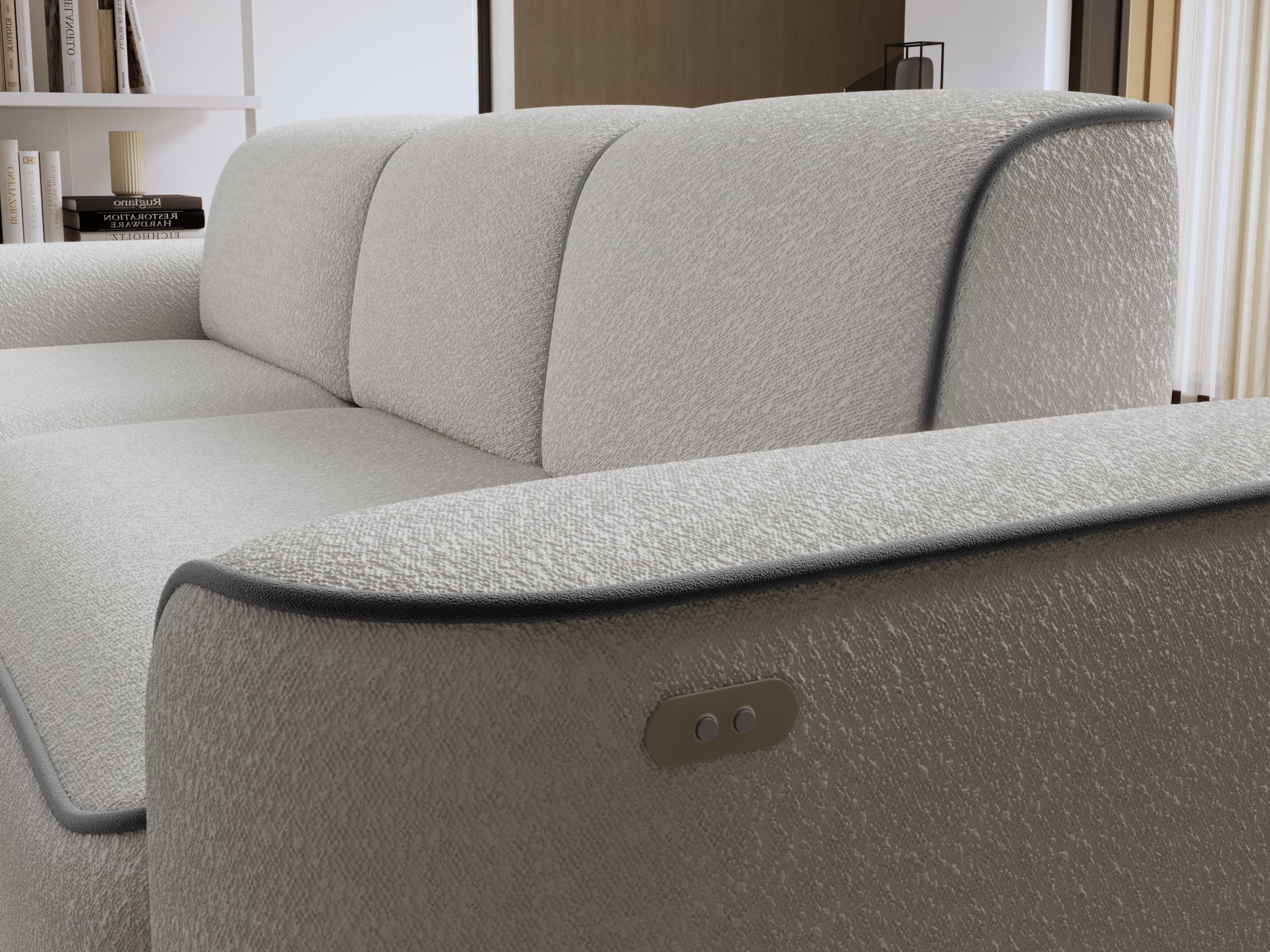 Zbliżenie na oparcie i lewy podłokietnik sofy Ume, teksturowane bouclé Royal 03 biały z kontrastową lamówką Velvetmat 04 szary.