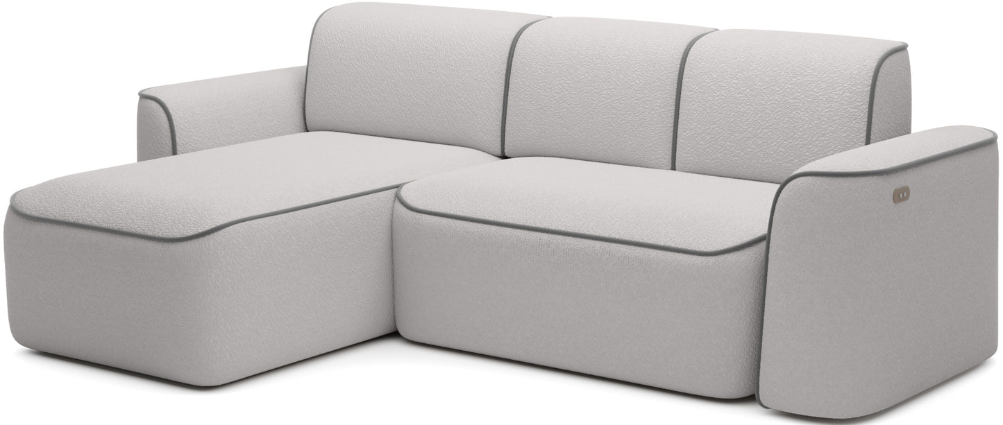 Perspektywiczny, ukośny widok narożnika Ume na białym tle, fakturowane bouclé Royal 03 biały z lamówką Velvetmat 04 szary.