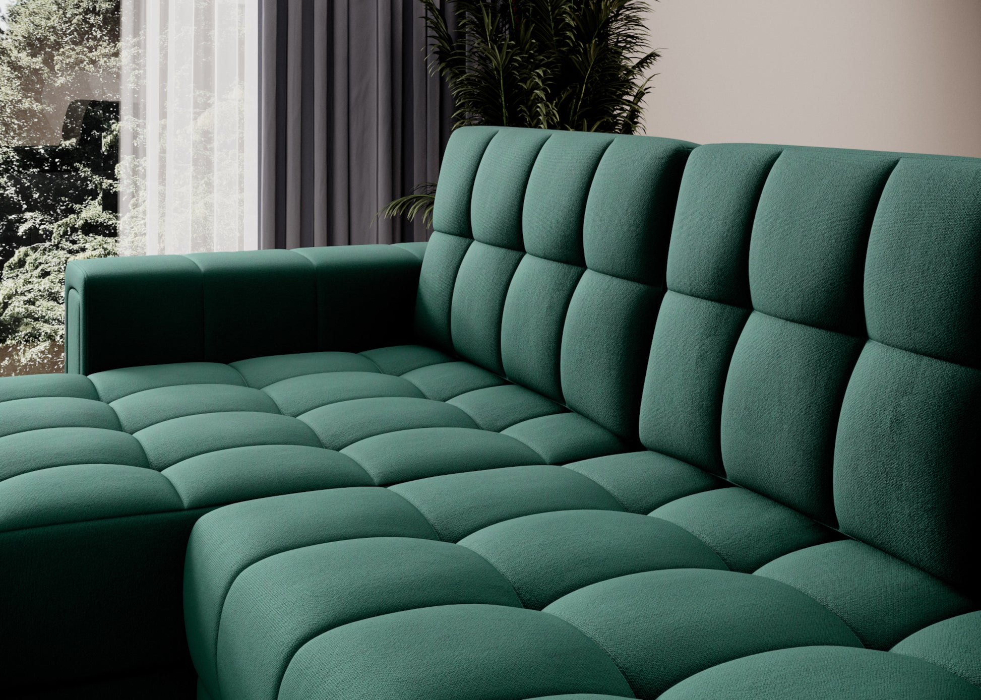 Zbliżenie na narożnik Blenvi w tkaninie Lukso 35 w kolorze butelkowej zieleni z ozdobnym pikowaniem siedziska i oparcia.