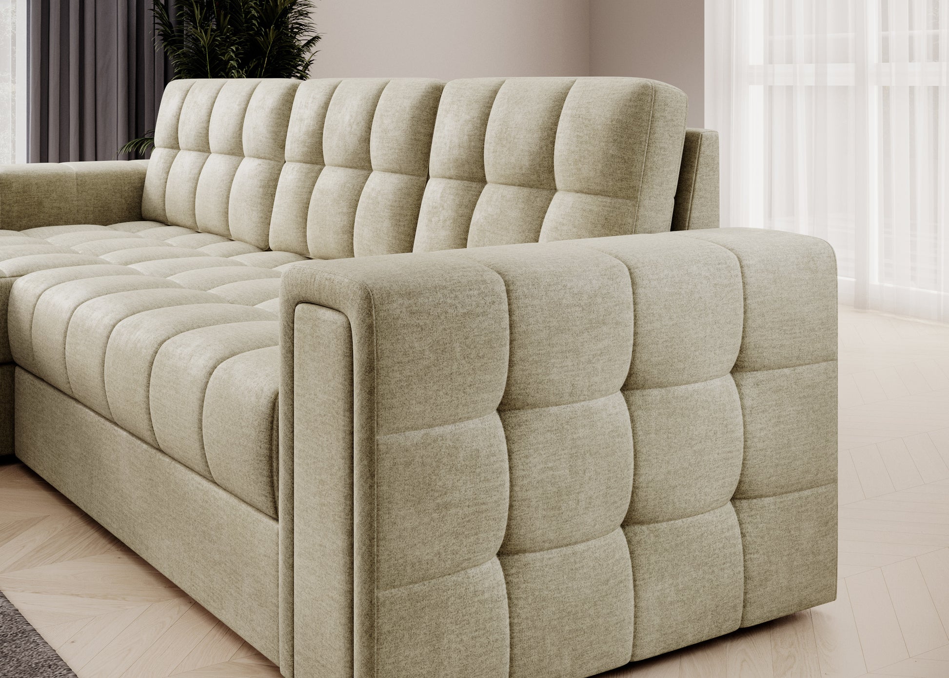 Zbliżenie na bok i oparcie narożnika Blenvi w tkaninie Monolith 04 beżowy, z charakterystycznym pikowaniem i miękkim wykończeniem.