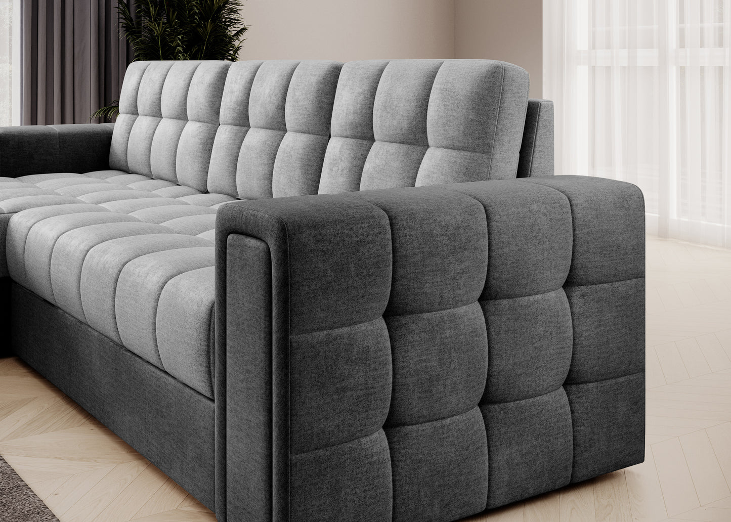 Bok narożnika w tkaninie Monolith 84 i 97 – eleganckie pikowanie, kontrast ciemnej i jasnej szarości, nowoczesny design.