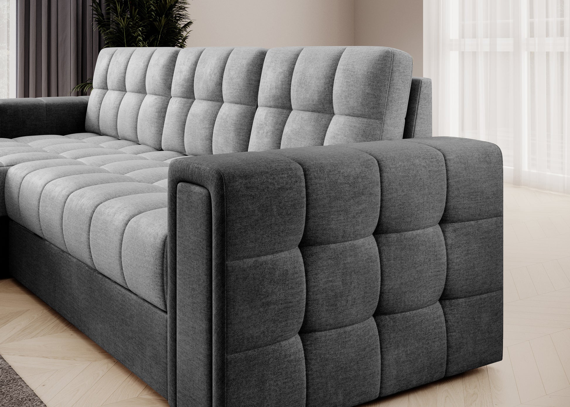 Bok narożnika w tkaninie Monolith 84 i 97 – eleganckie pikowanie, kontrast ciemnej i jasnej szarości, nowoczesny design.