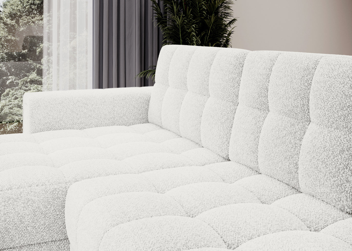 Zbliżenie na tapicerkę sofy Royal 01 biały – miękkie pikowane siedzisko i oparcie w stylu bouclé w jasnym nowoczesnym wnętrzu.