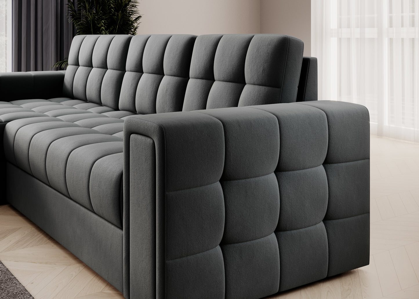 Bok i oparcie sofy narożnej w tkaninie Sola 06 szary – pikowana tapicerka i nowoczesne linie w eleganckim, jasnym wnętrzu.