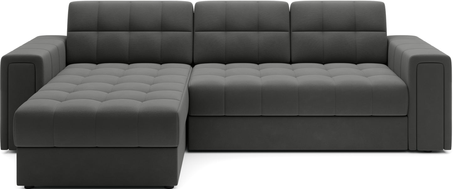 Szara sofa narożna z pikowanym siedziskiem i oparciem, nowoczesny model z funkcją spania i pojemnikiem na pościel.