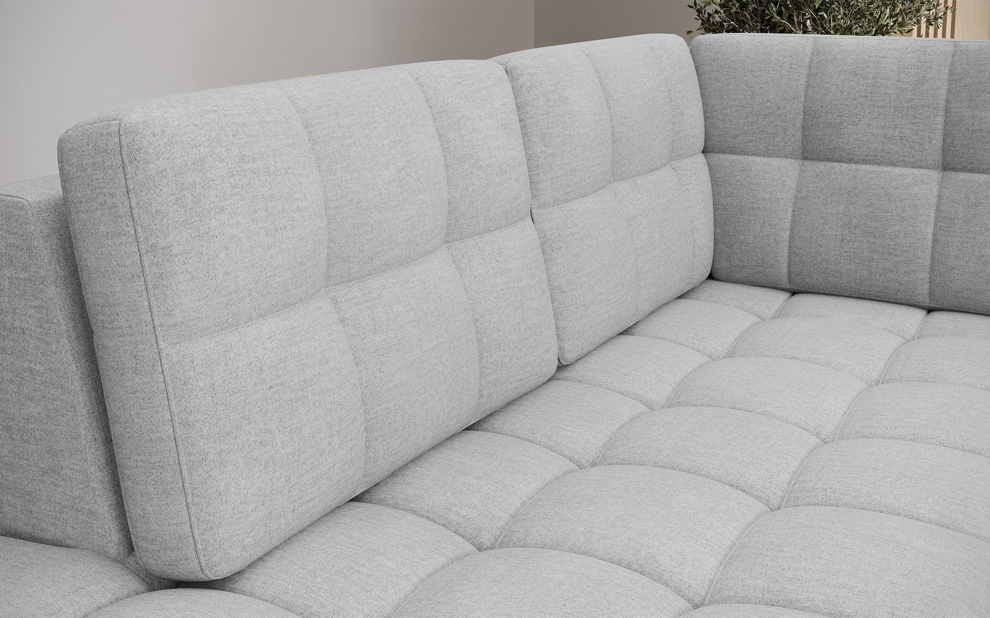 Oparcie narożnika Blewett Monolith 84 jasnoszary z eleganckim pikowaniem. Komfortowe i stylowe wykończenie do salonu.