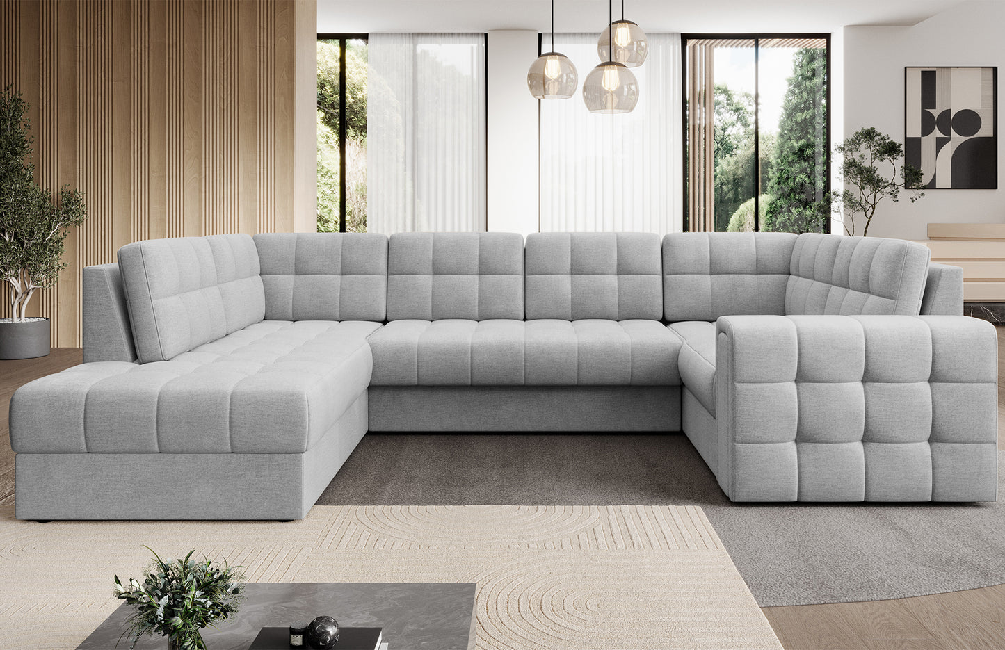 Narożnik Blewett Monolith 84 jasnoszary ustawiony na skos w aranżacji salonu. Komfortowy, stylowy i nowoczesny mebel wypoczynkowy.