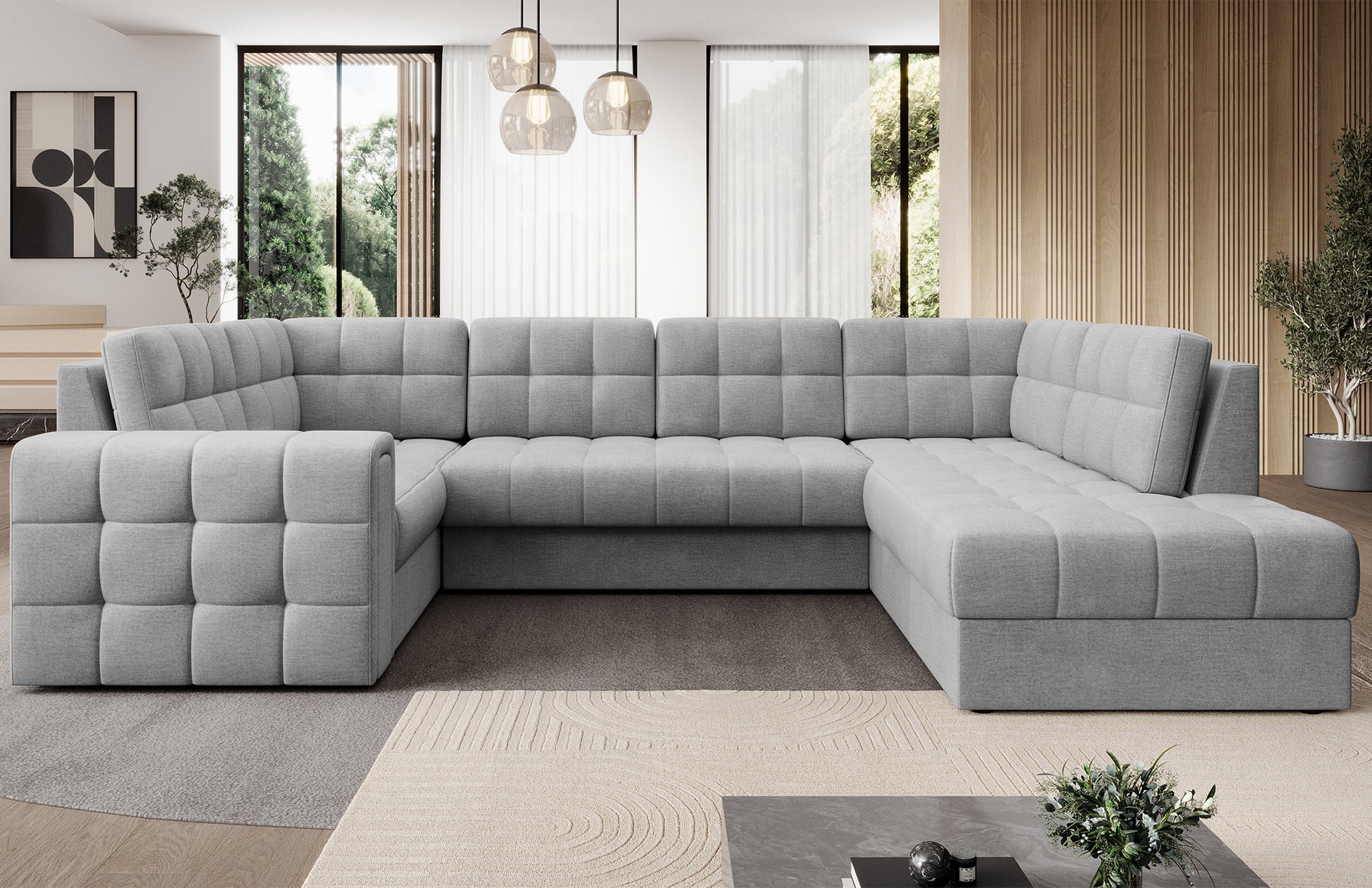 Narożnik w wersji prawej Blewett Monolith 85 szary w eleganckim salonie. Stylowy design, komfort i pikowana tapicerka w nowoczesnym, przytulnym wnętrzu.