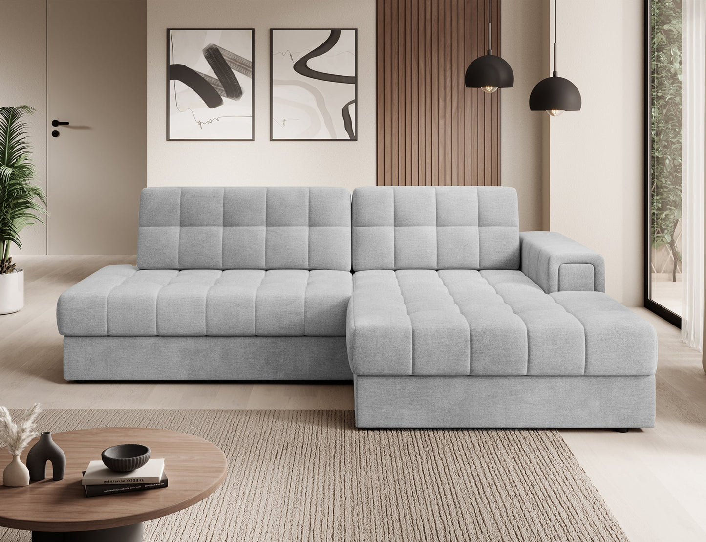 Prawy narożnik Blezalt Monolith 84 jasnoszary – nowoczesna sofa z szerokim podłokietnikiem i pikowanym siedziskiem w jasnym wnętrzu.
