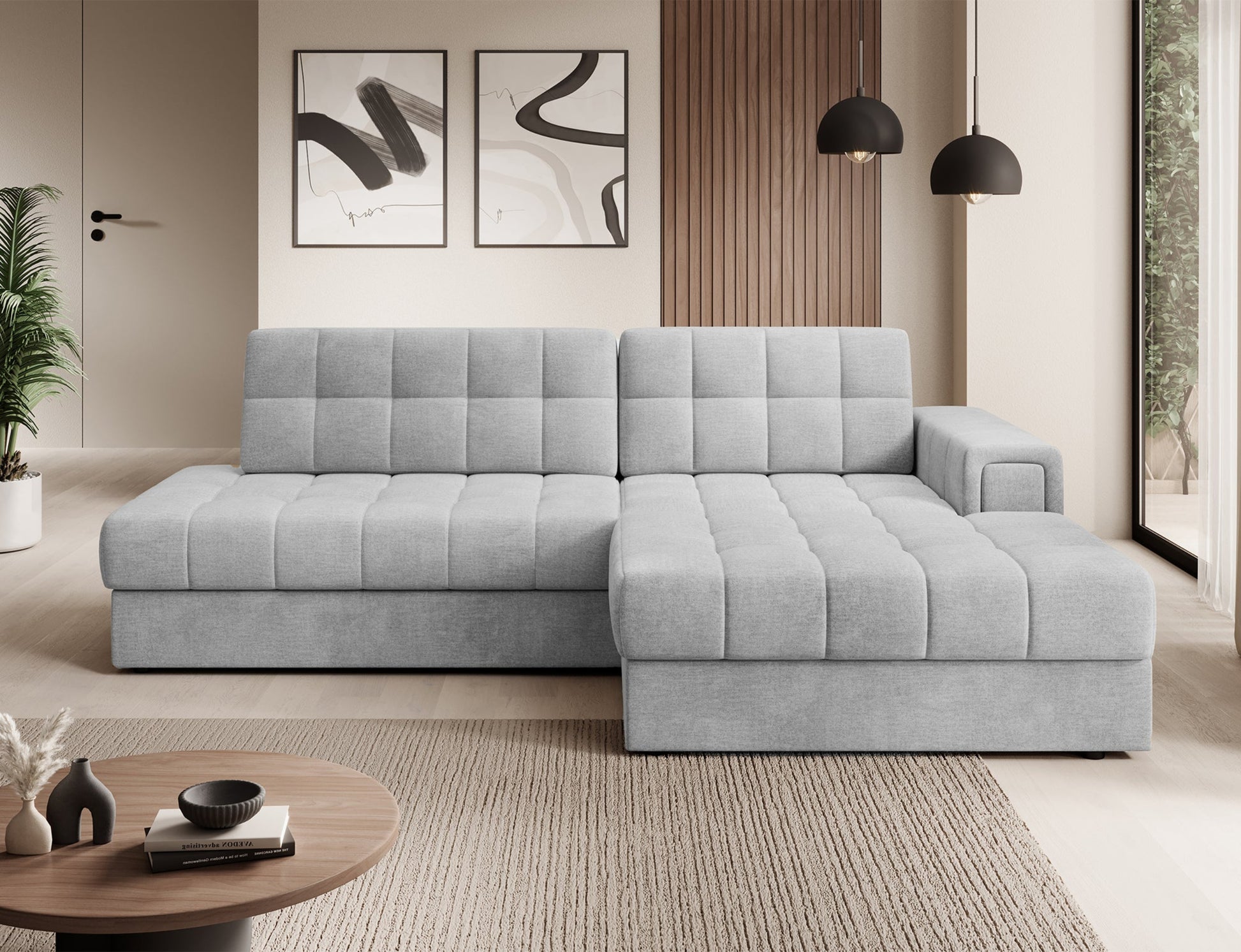 Prawy narożnik Blezalt Monolith 84 jasnoszary – nowoczesna sofa z szerokim podłokietnikiem i pikowanym siedziskiem w jasnym wnętrzu.