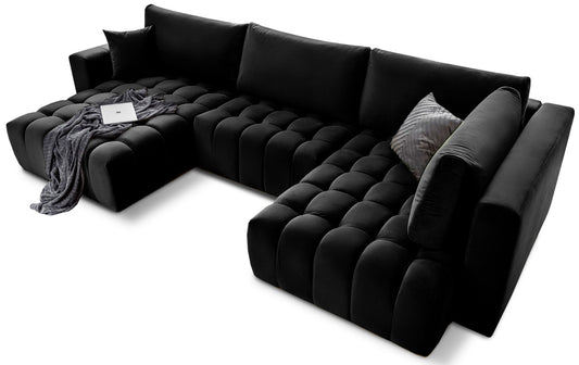 Czarny narożnik Bonito lewy w tkaninie Loco 10 prezentuje nowoczesny design z efektownym pikowaniem i głębokim siedziskiem. Stylowy narożnik do dużego salonu zapewnia wygodę codziennego wypoczynku i elegancki wygląd wnętrza.