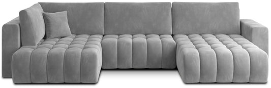 Jasnoszary narożnik Bonito prawy w tkaninie Sola 04 wyróżnia się nowoczesnym designem, miękkim pikowanym siedziskiem oraz elegancką formą. Komfortowy narożnik do salonu doskonale sprawdzi się w jasnych i minimalistycznych aranżacjach wnętrz.