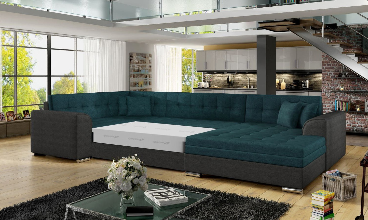 Narożnik Damario w kolorze zielonym i ciemnoszarym z rozłożoną funkcją spania, prezentacja powierzchni przeznaczonej do komfortowego wypoczynku.