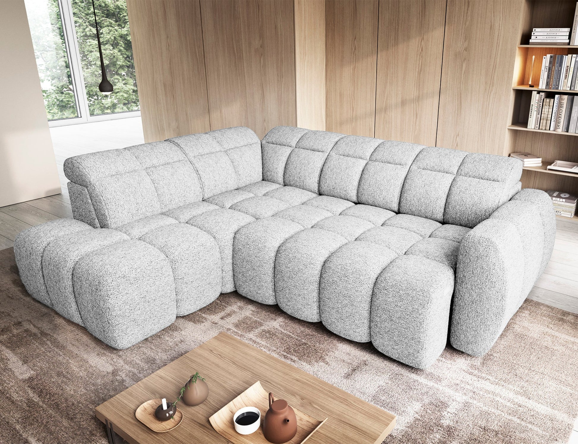 Narożnik Falconn lewostronny Coralline 01 w funkcji spania, ustawiony w salonie z drewnianą zabudową i niskim stolikiem kawowym.