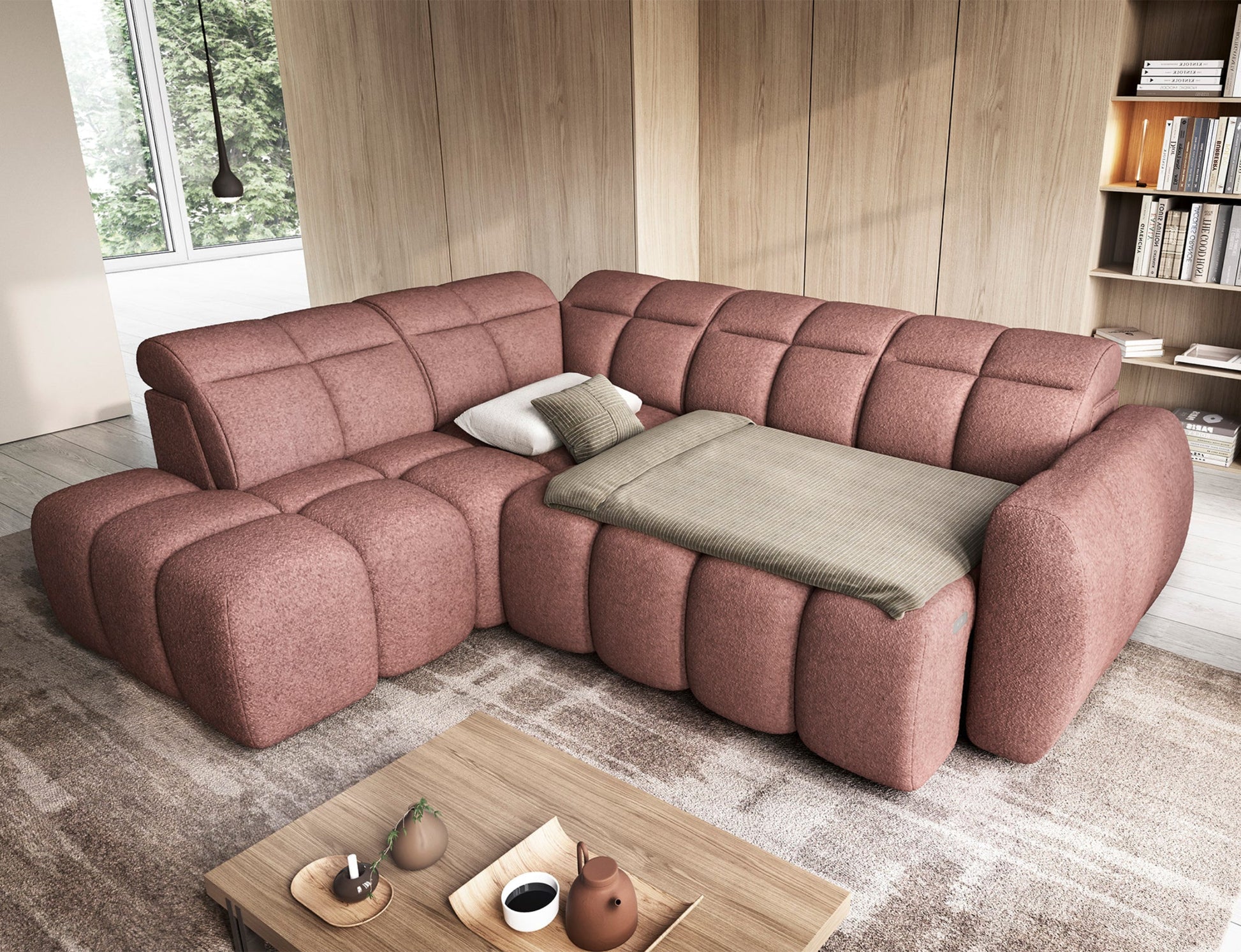 Narożnik Falconn Paolli 24 różowy z funkcją spania, rozłożone siedzisko z poduszkami, nowoczesny salon w jasnym, przytulnym stylu.