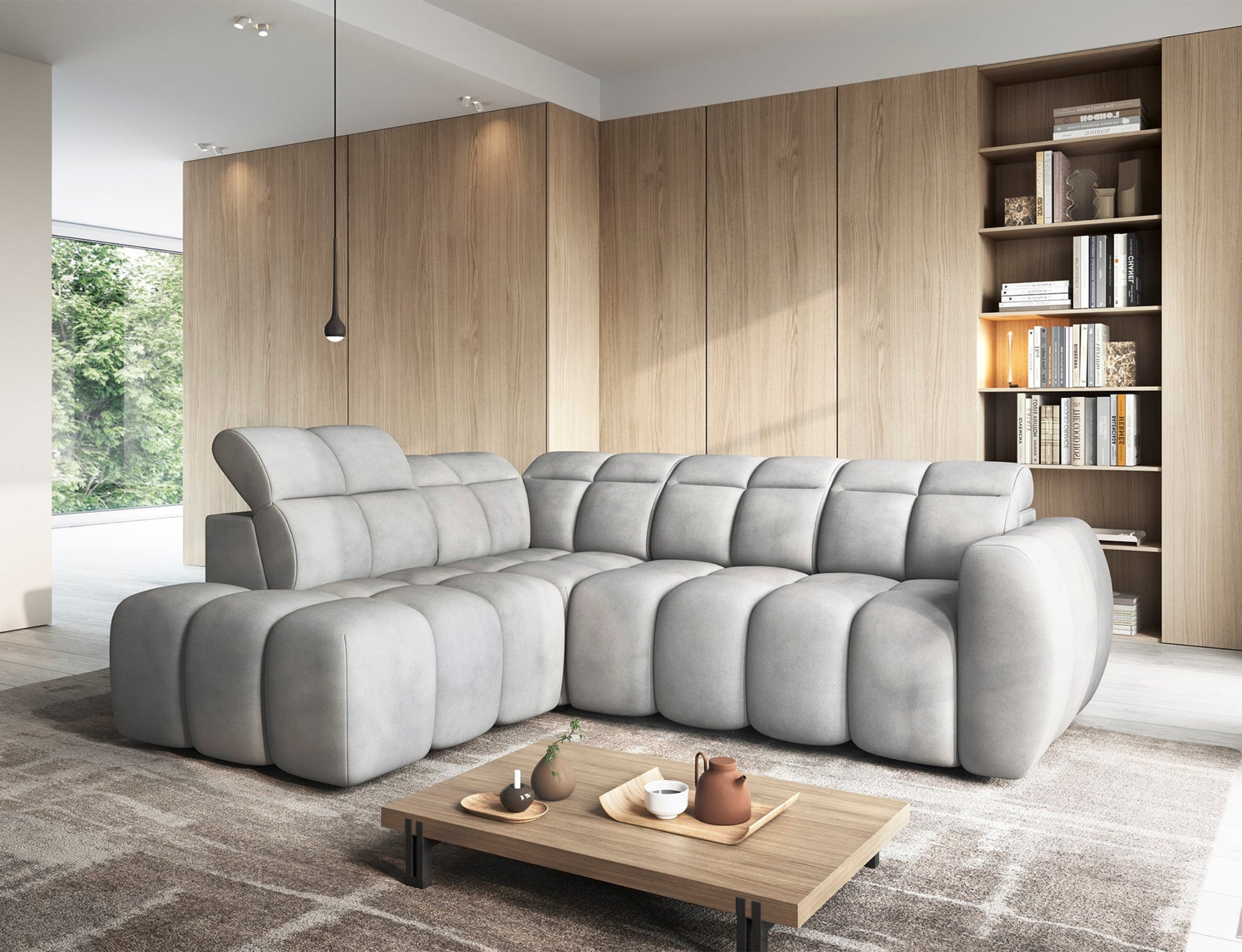 Narożnik Falconn Sola 04 w jasnoszarym kolorze, modułowa konstrukcja, miękkie tapicerowane siedziska, nowoczesna forma z zaokrąglonymi krawędziami.