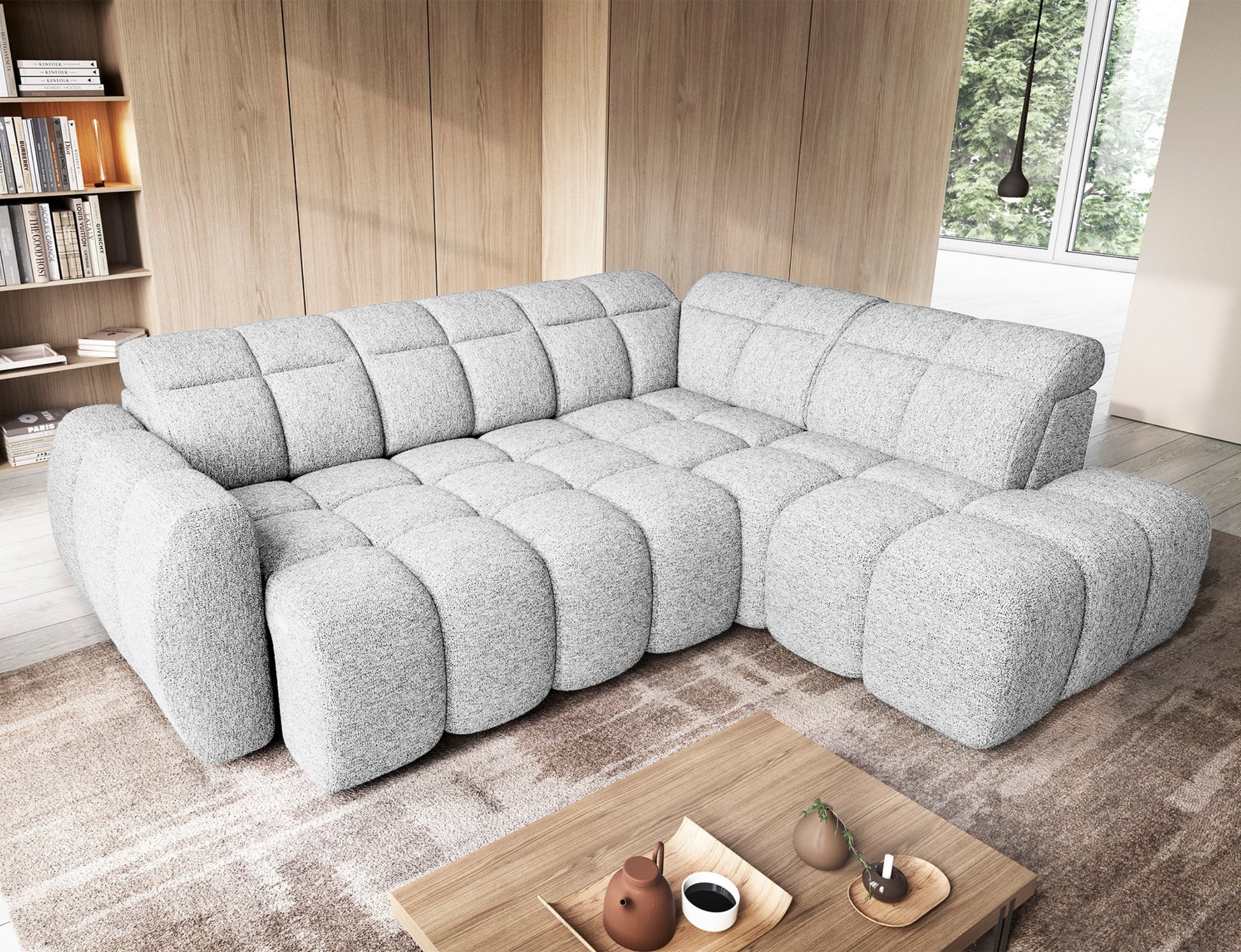 Narożnik Falconn Coralline 01 w białej tkaninie, widok z góry w aranżacji salonowej, rozłożona funkcja spania, poduszki dekoracyjne na siedzisku.