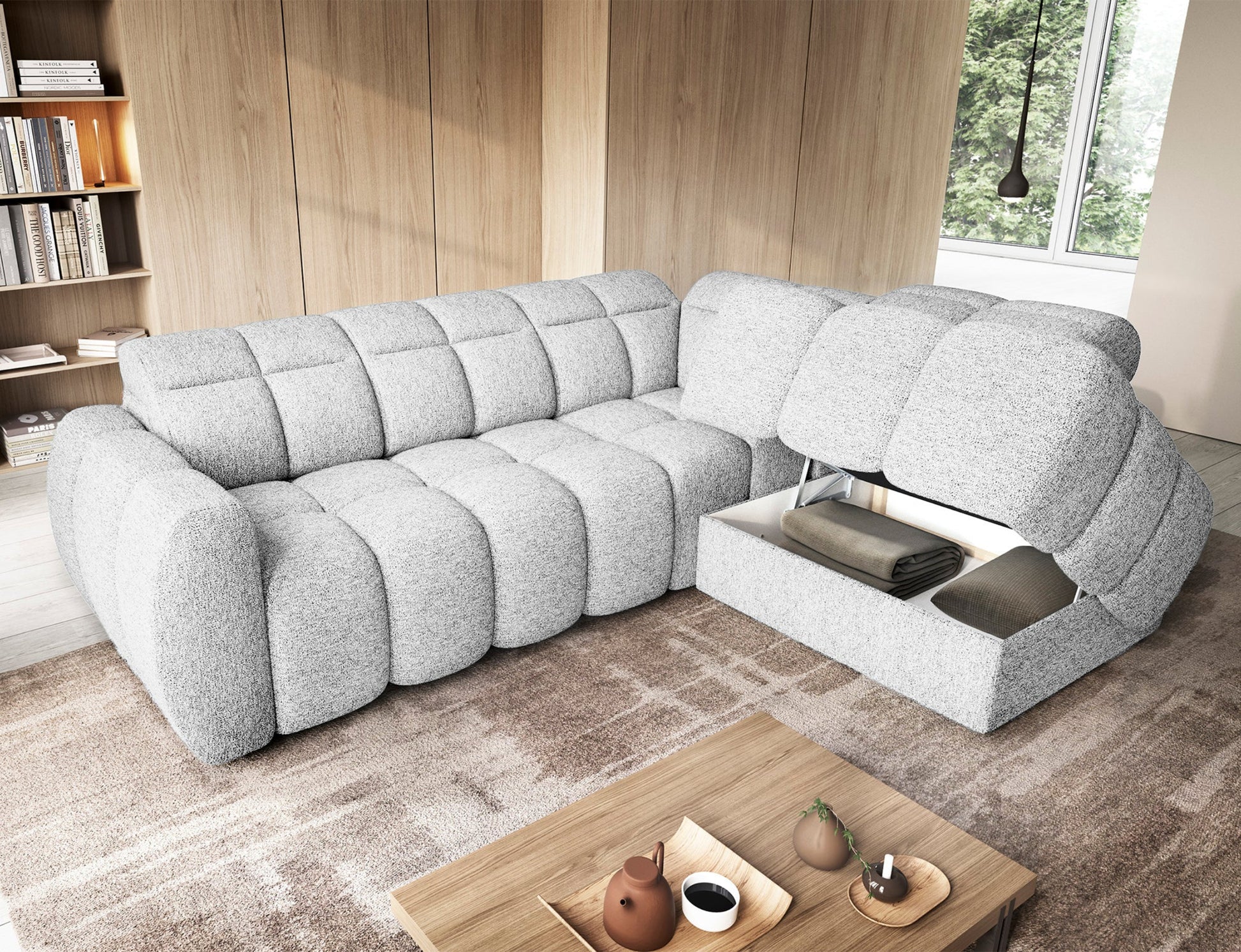 Narożnik Falconn Coralline 01 w białej tkaninie, otwarta funkcja pojemnika na pościel z widocznymi kocami, w nowoczesnym wnętrzu salonowym.