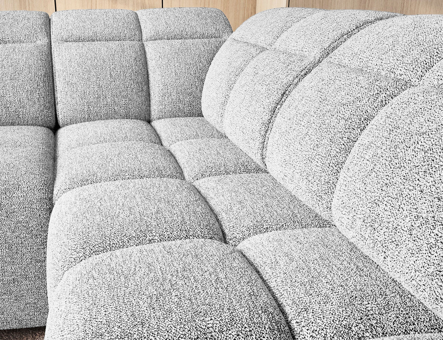 Narożnik Falconn Coralline 01 w kolorze białym — szczegółowy widok siedziska z wyraźnie widoczną fakturą tkaniny i wyprofilowaniem oparcia.