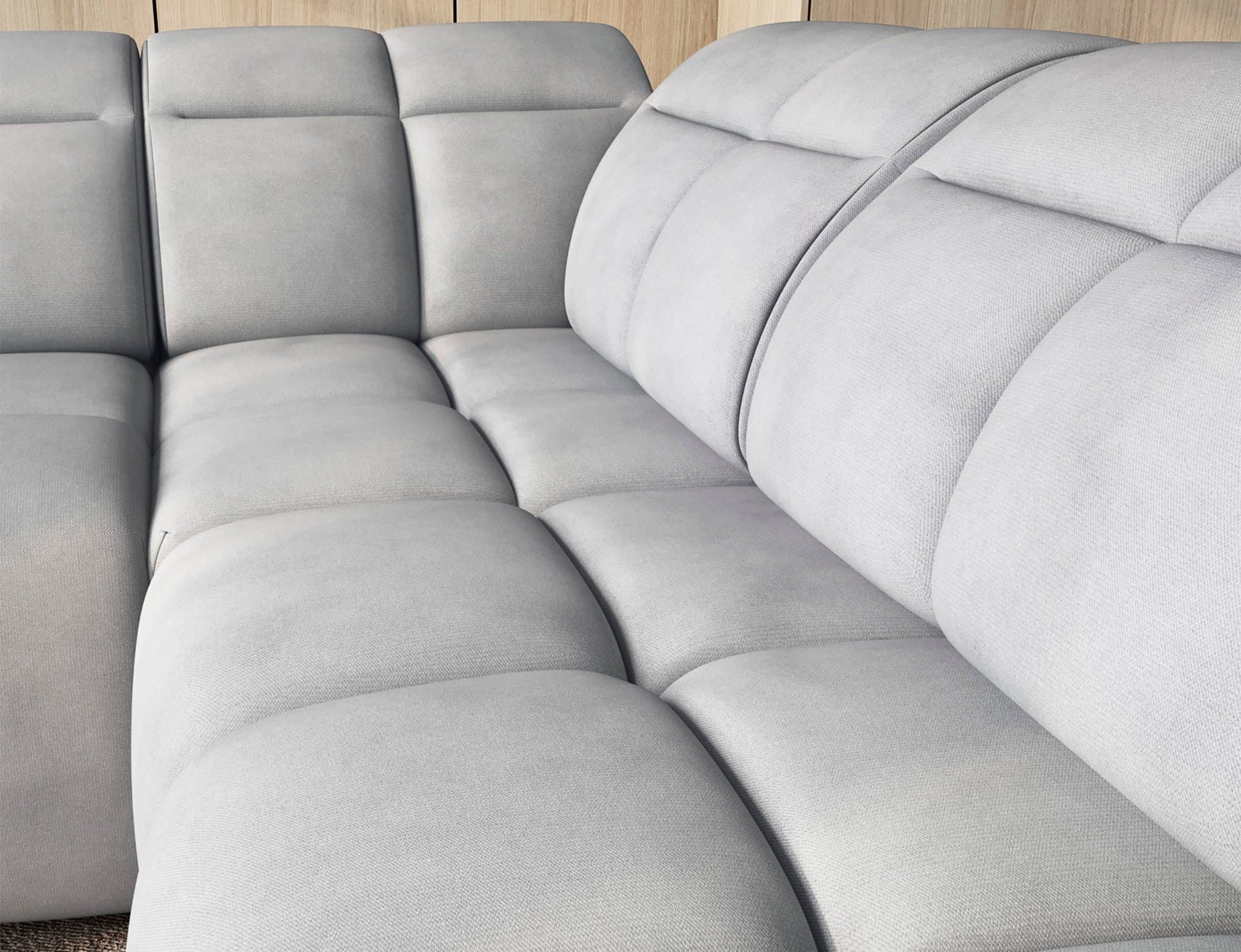 Zbliżenie na jasnoszary narożnik Sola 04 – miękkie siedziska, nowoczesny design i wysoki komfort do salonu w stylu skandynawskim.