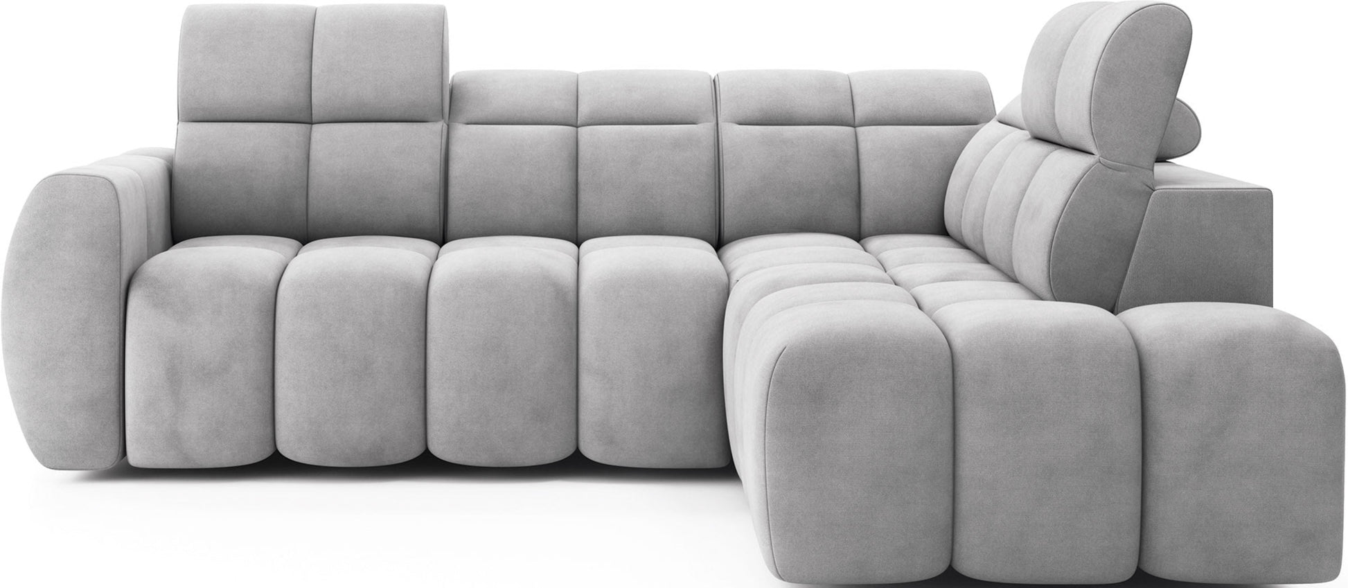 Jasnoszary narożnik Sola 04 z przodu – elegancka sofa narożna z miękkim siedziskiem, wysokim oparciem i regulowanym zagłówkiem.