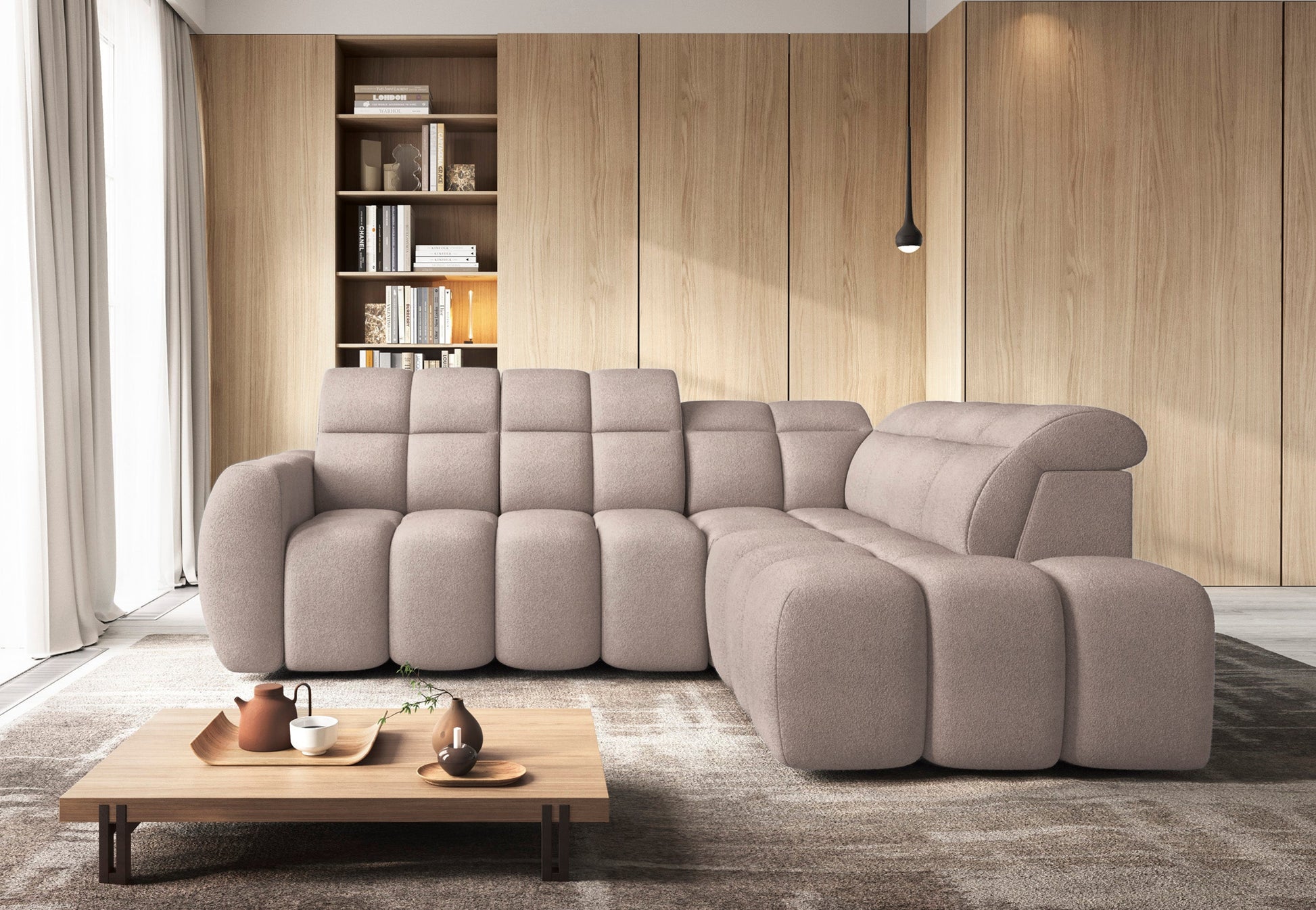 Narożnik Xillar 20 ciemnobeżowy – elegancka aranżacja salonu z nowoczesnym narożnikiem o pikowanej powierzchni i regulowanych zagłówkach.