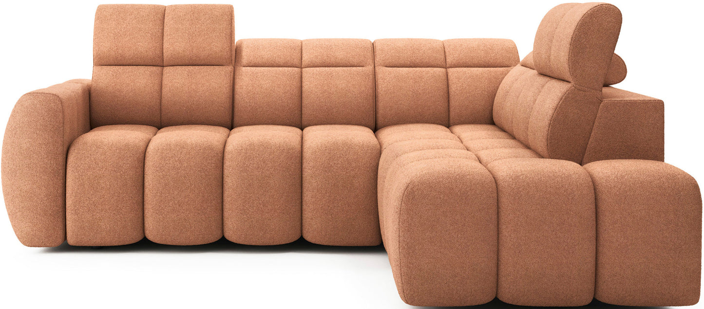 Narożnik Xillar 24 różowy z dużymi siedziskami, regulowanymi zagłówkami i nowoczesnym designem, widok na całą bryłę od frontu.