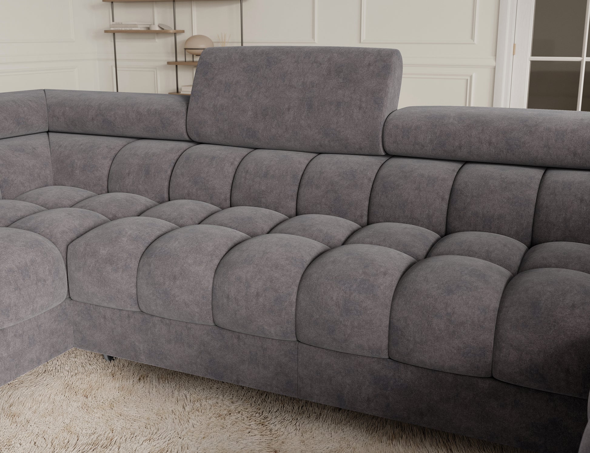 Widok na komfortową część narożnika Fectory z zaokrąglonymi krawędziami, idealny do nowoczesnych wnętrz.