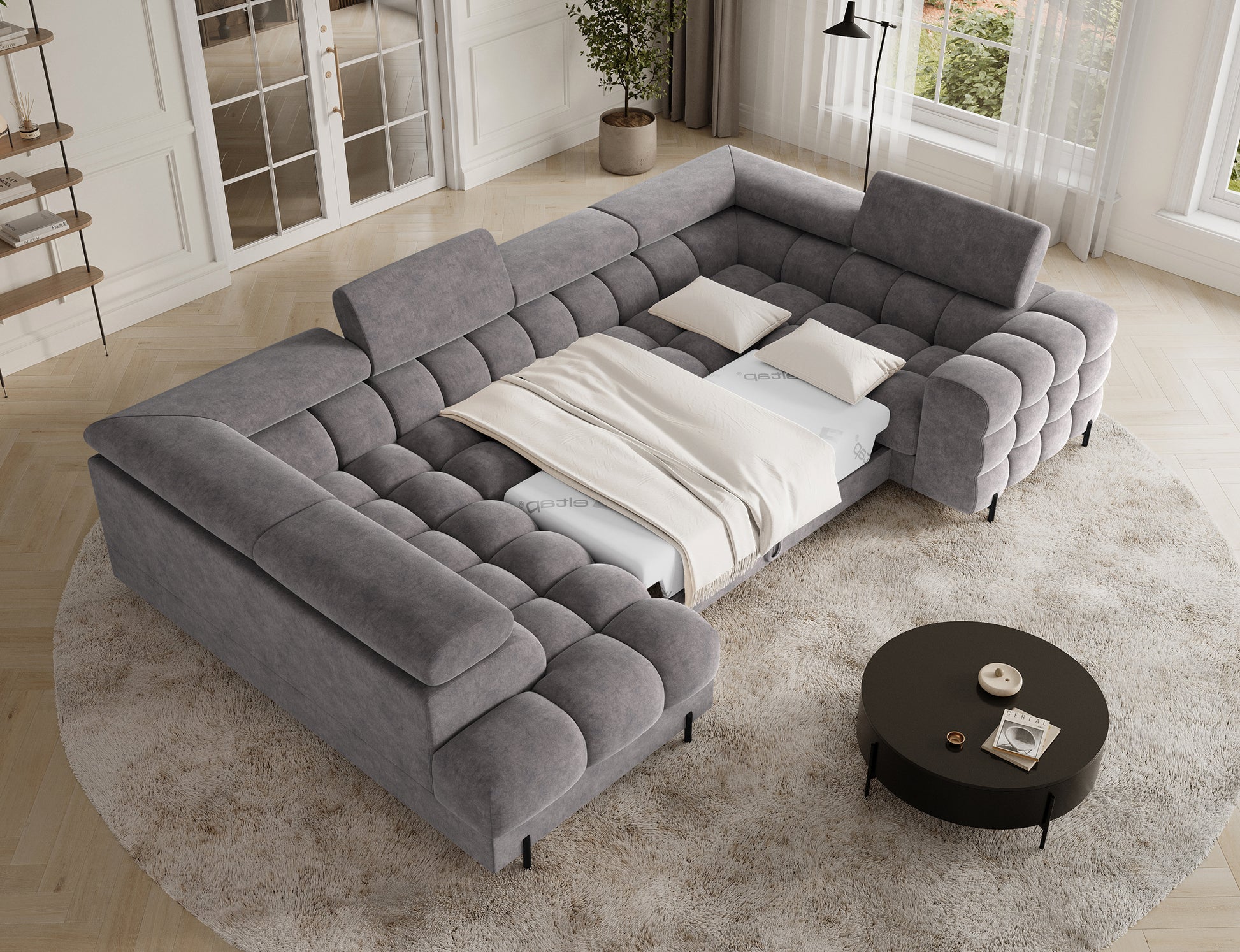 Elegancka sofa narożna z funkcją spania w szarym kolorze, idealna do każdego salonu z przestronnym miejscem do wypoczynku.