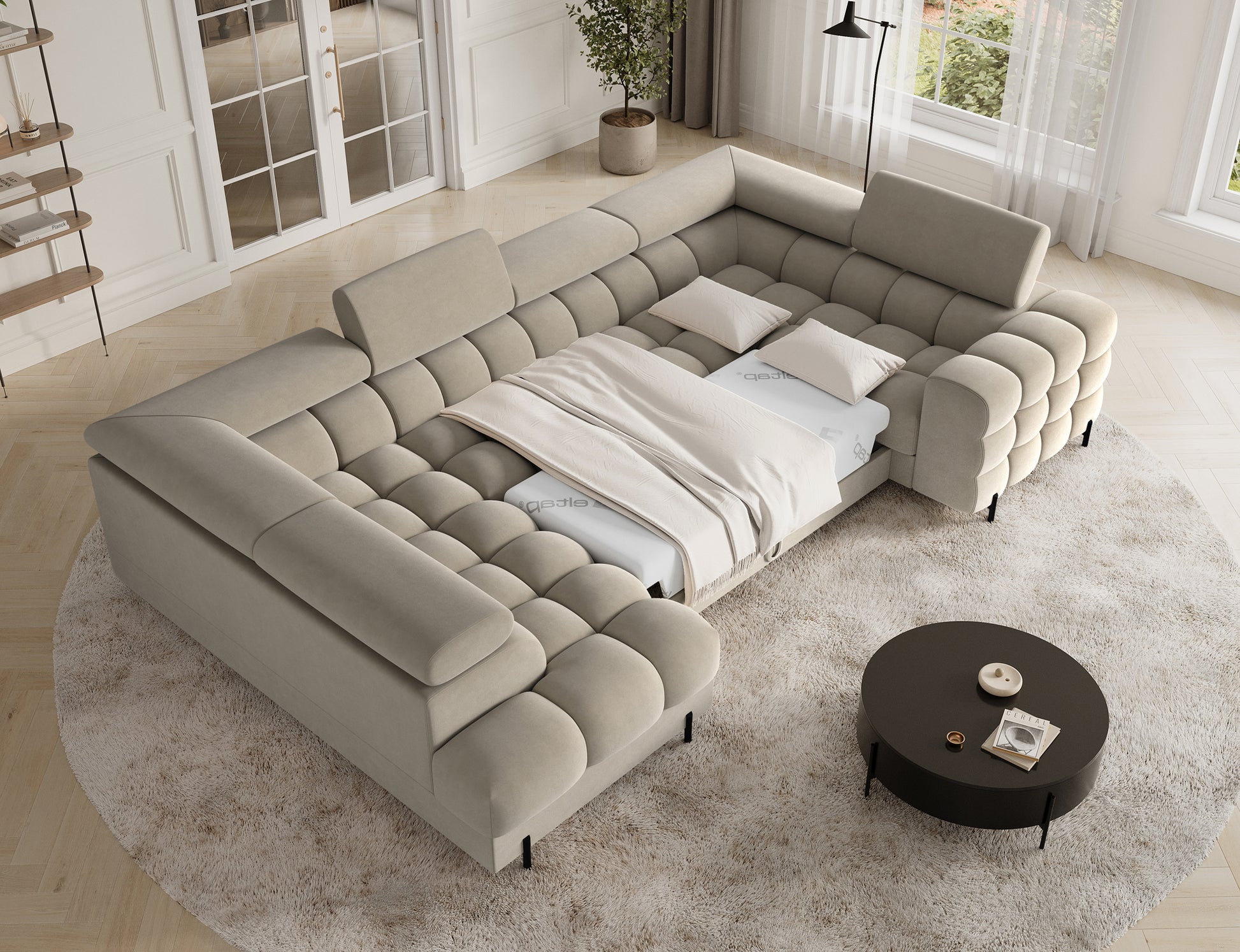 Narożnik Fectory lewy Aura 18 kremowy – rozłożona funkcja spania, pikowane siedziska, regulowane zagłówki; ujęcie z góry w salonie