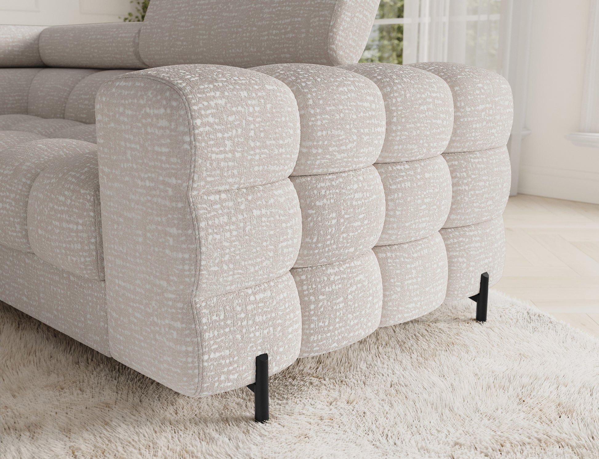 Bok narożnika Fectory Baffix 20 beżowy – widoczne pikowania, zaokrąglone kształty i czarne metalowe nogi.