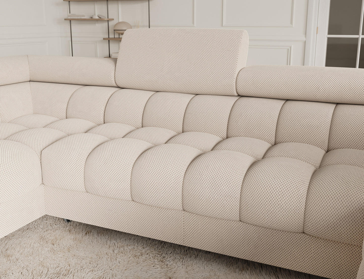 Środkowa część narożnika Fectory Calmora 18 beżowy z pikowanym siedziskiem i zagłówkiem, widok z bliska.