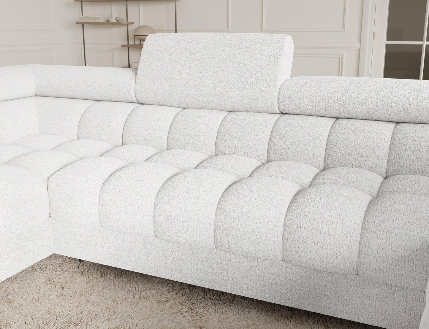 Zbliżenie na narożnik Fectory w białym kolorze, ukazujące doskonałą jakość materiału i elegancki wygląd. Idealny wybór do stylowych wnętrz.