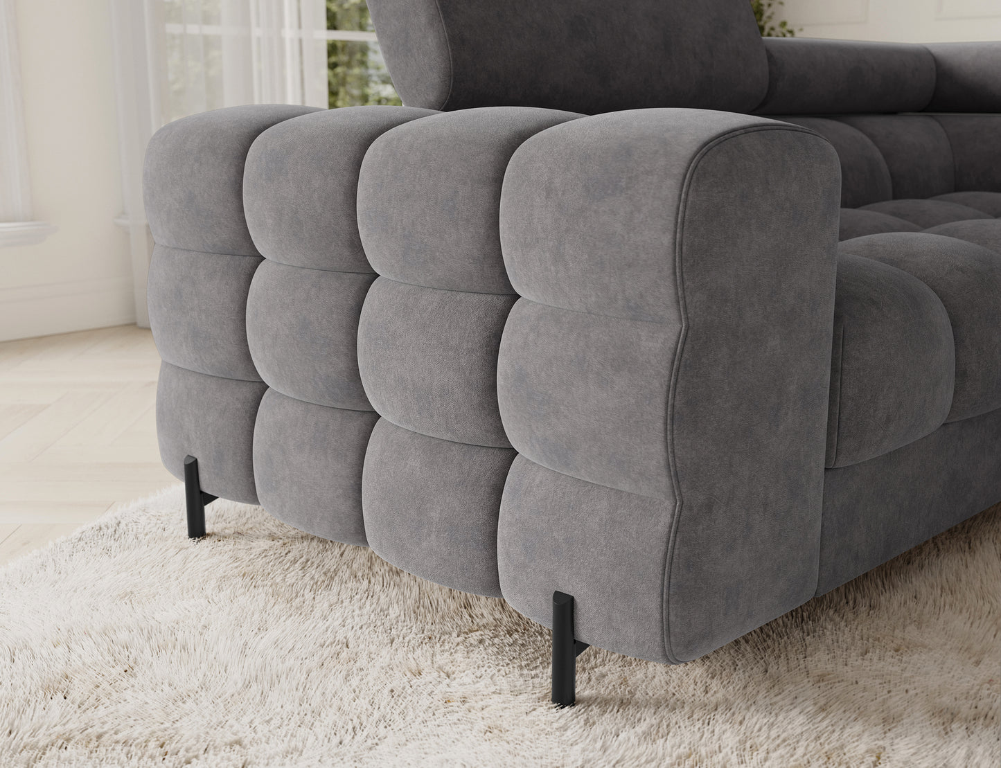 Detal narożnika Fectory w szarym kolorze z widoczną funkcją spania, ukazujący jego elegancki i praktyczny design.