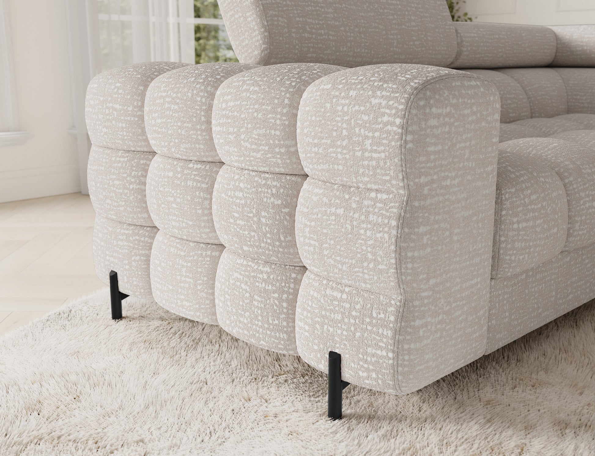 ELTAP narożnik Fectory prawy Baffix 20 beżowy – detal podłokietnika: głębokie pikowanie, miękkie kształty, czarne smukłe nogi