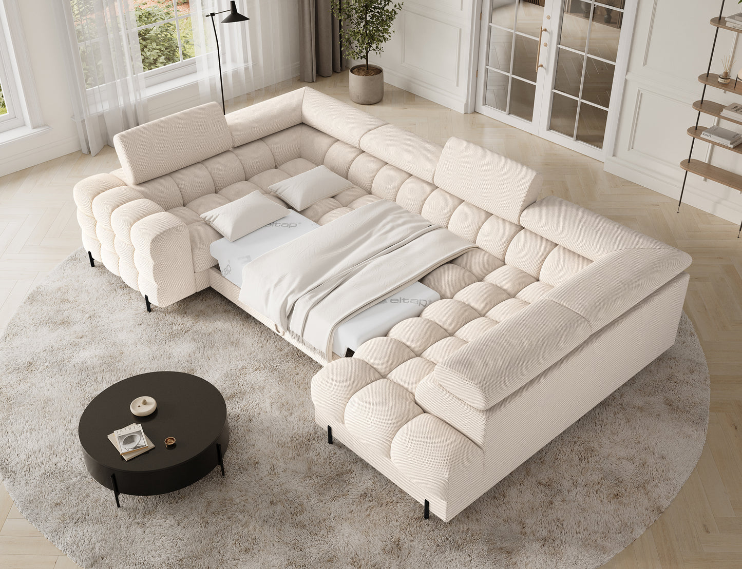 Narożnik Fectory Calmora 18 beżowy z rozłożoną funkcją spania typu Delfin – widok z góry z pościelą.