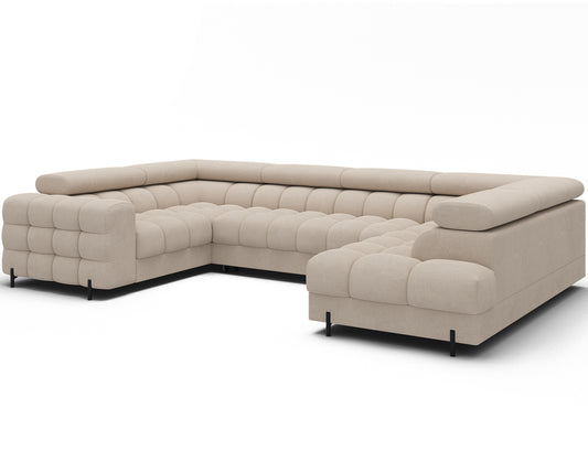 Narożnik Fectory Calmora 18 beżowy w kształcie litery U, widok skośny, z widocznym tapicerowanym tyłem i pikowanym siedziskiem