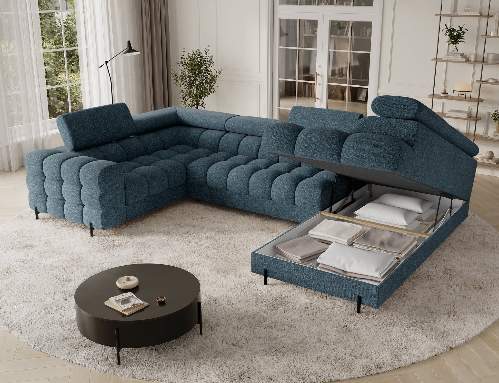 Narożnik Fectory w niebieskim odcieniu z pojemnikiem na pościel, doskonały do przechowywania i utrzymania porządku w salonie.