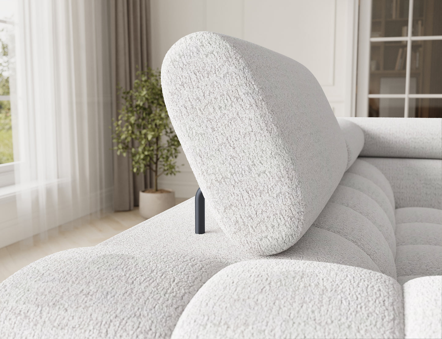 Narożnik Fectory w kolorze białym, z widocznymi, regulowanymi zagłówkami, które zapewniają dodatkowy komfort użytkowania.